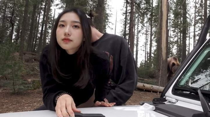 Will she choose the man or the bear?