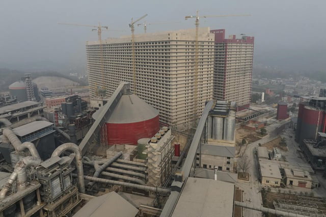 These high rises are modern pig farms in China. (Source in comments)