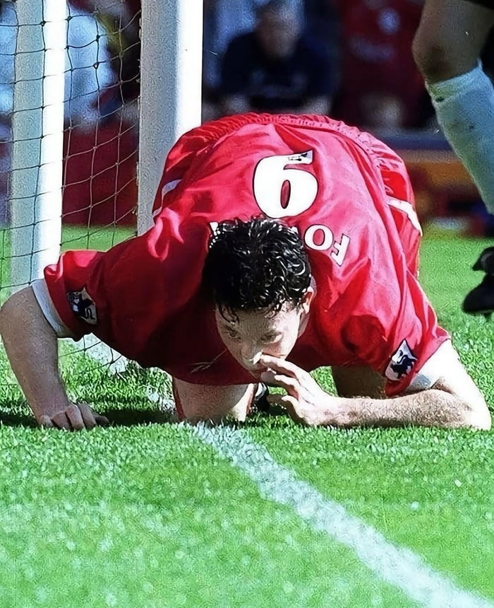 Robbie Fowler infamous goal celebration that got him a 4 game ban and 40k fine in 1999.