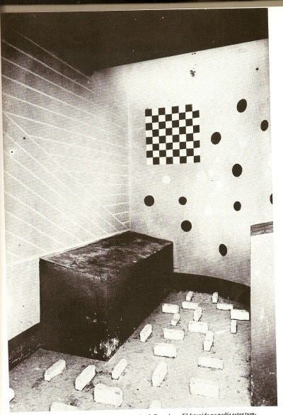 During the Spanish Civil War, French architect surrealist painter Alphonse Laurencic designed holding cells for the Spanish government. He built beds in such a manner that the prisoners would roll off them, and placed obstacles on the floor making it