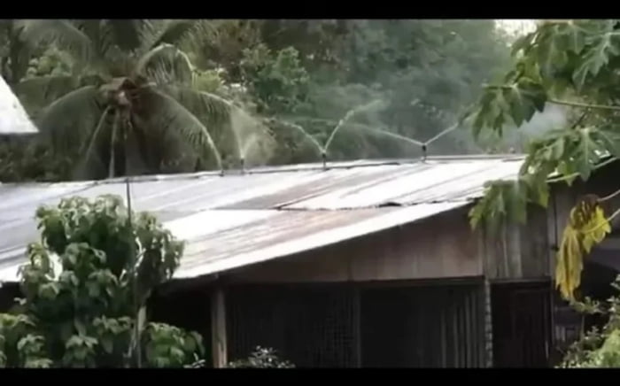 House in the Philippines attach a sprinkler in their rooftop to beat the heat