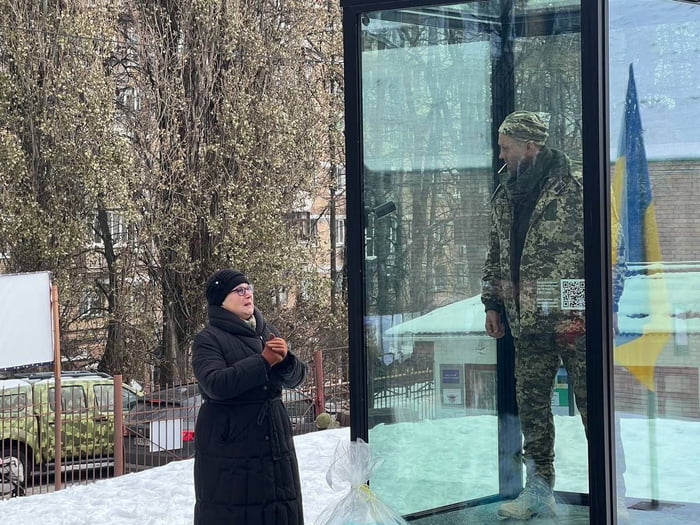 The Mother visiting the statue of her Son Oleksandr Matsievskyi