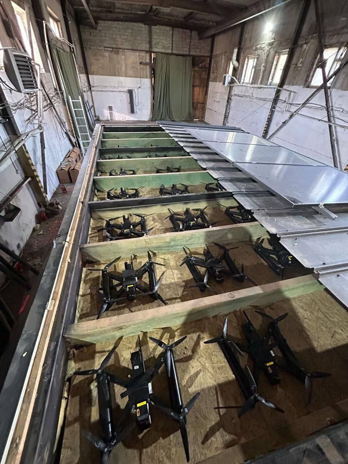 Ukraine release photo's showing how they hid the drones in the top of shipping containers. The drivers were just Russians who had no idea this was hidden in the containers they were driving around.