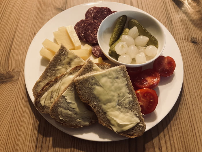 Want to share this with you guys—it might not look like much, but it's 9:45 PM, i got home from work, and my wife had prepared this for me. Deer salami that I made, cheese and butter made by dad on the alp, with bread made by my wife. 20y together an