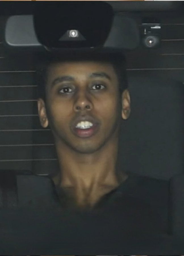 Johnny Somali being transported in a Japanese police van recently. He's not smiling, he faces up to 3 years in jail for trespassing