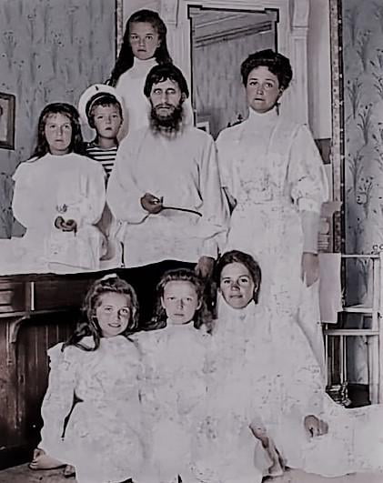 Colorized photo of Rasputin with Tsarina Alexandra Fyodorovna, her children and their nurse, 1908
