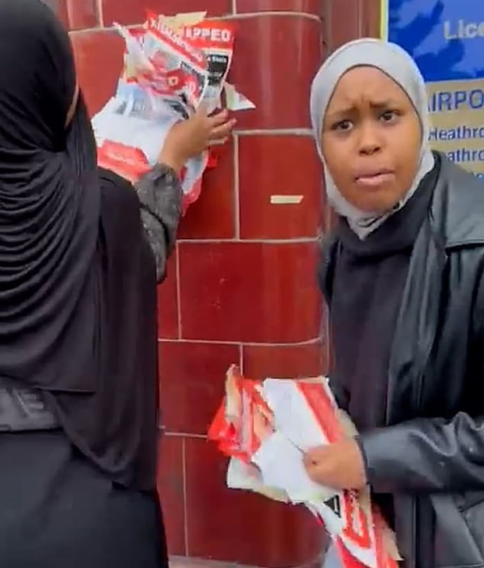 In London this lady’s removes posters of children who got kidnapped in Israel of Hamas