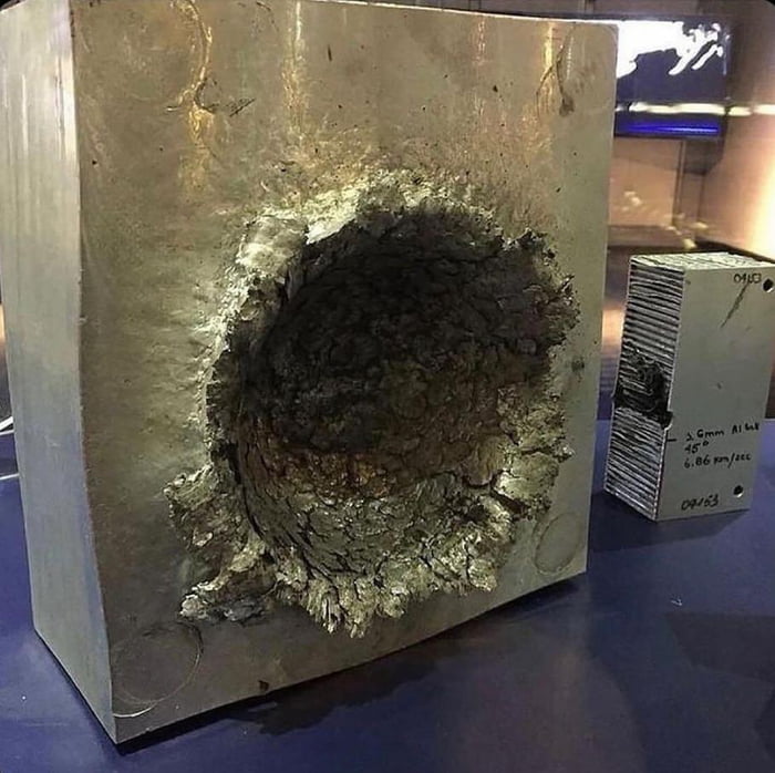 The consequences of a .5 inch (1.2 cm) piece of plastic hitting a block of aluminum at 15000 mph (24000 km/h), simulating an impact in space