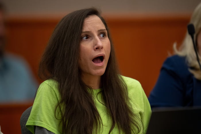 Lady's initial reaction to hearing she got sentences to life.
