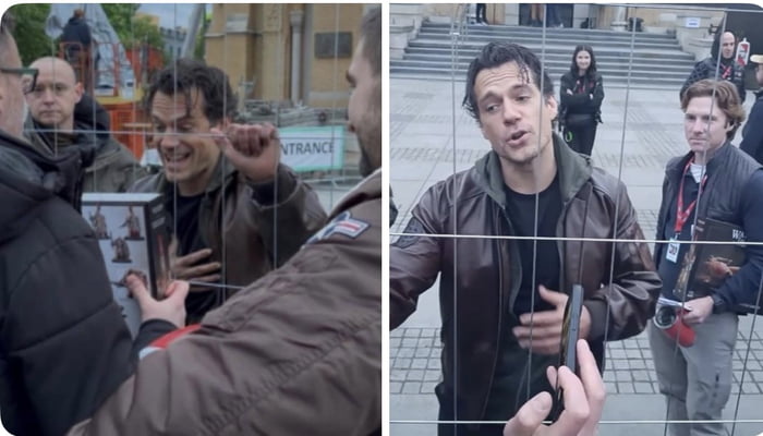 Henry Cavill receiving from a fan a warhammer 40k adeptus custodes kit (the faction he plays) in poland where the new Highlander movie is being filmed