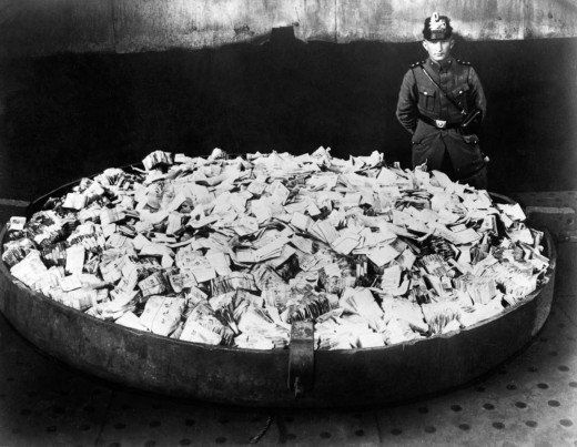 Unknown beggar poses with one day earnings during hyperinflation