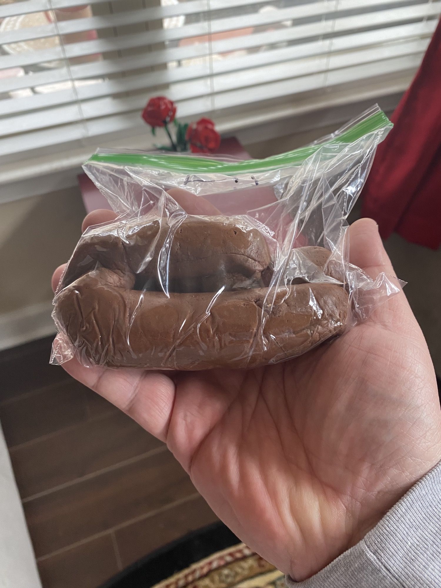 It is International Hot Chocolate Day, so my son made chocolate Play Doh at pre-school.