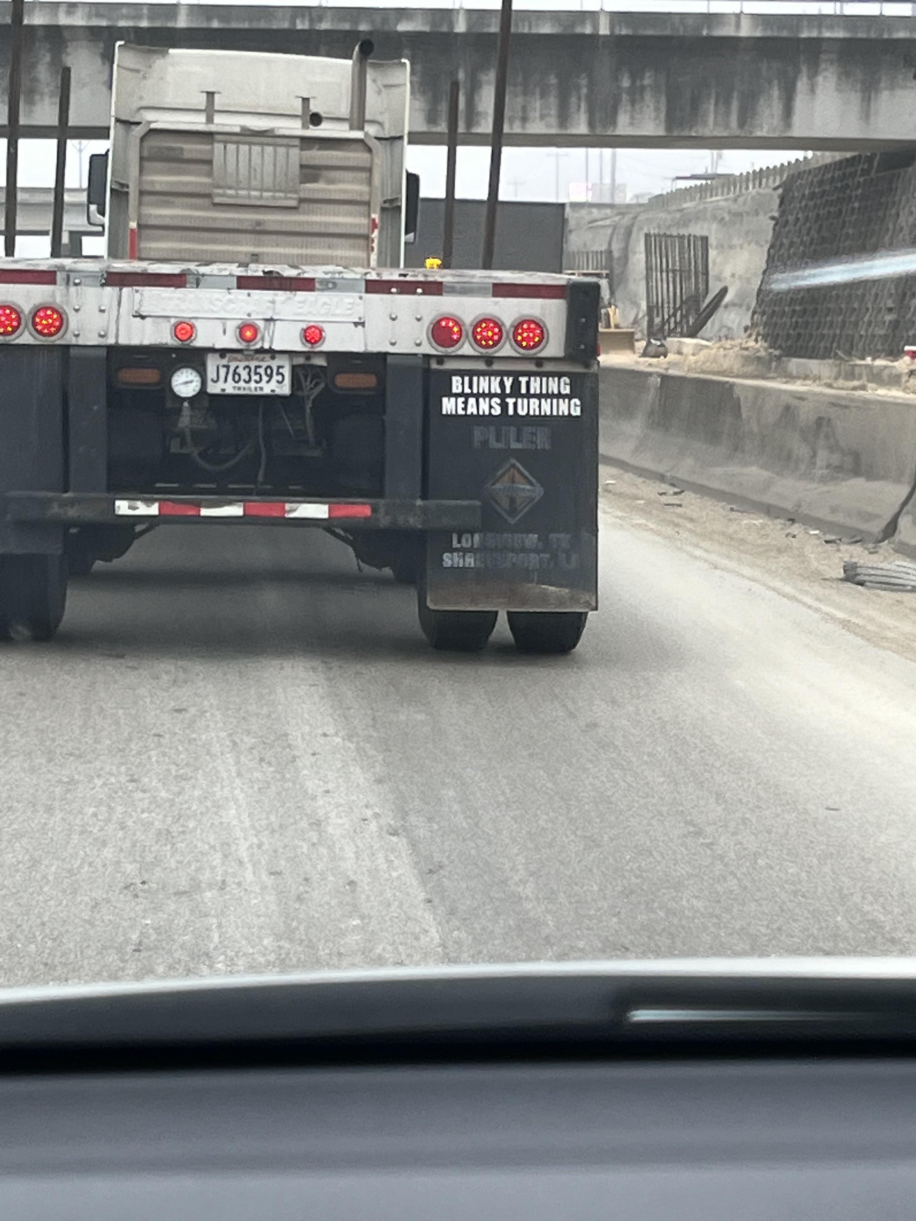 Helpful message on an 18-Wheeler mudflap