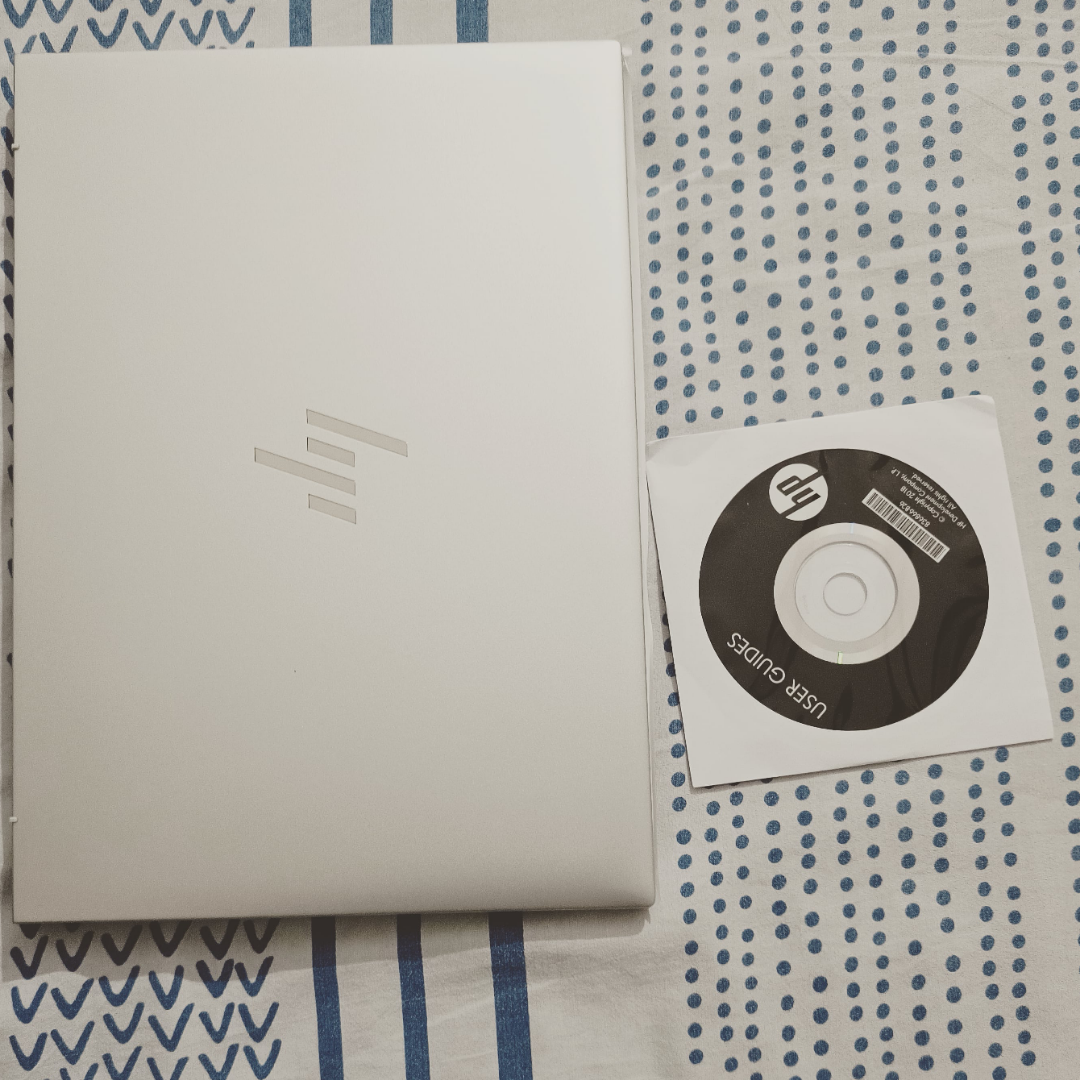 My company provided me a brand new laptop with a user manual DVD. The laptop does not have a DVD player.