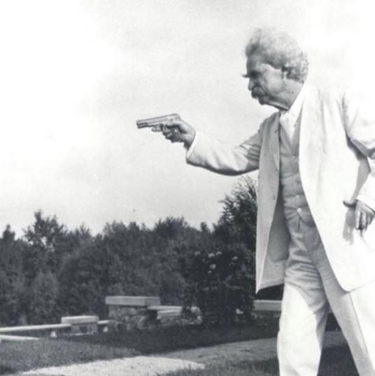 Tesla test shooting his first ray gun 1900