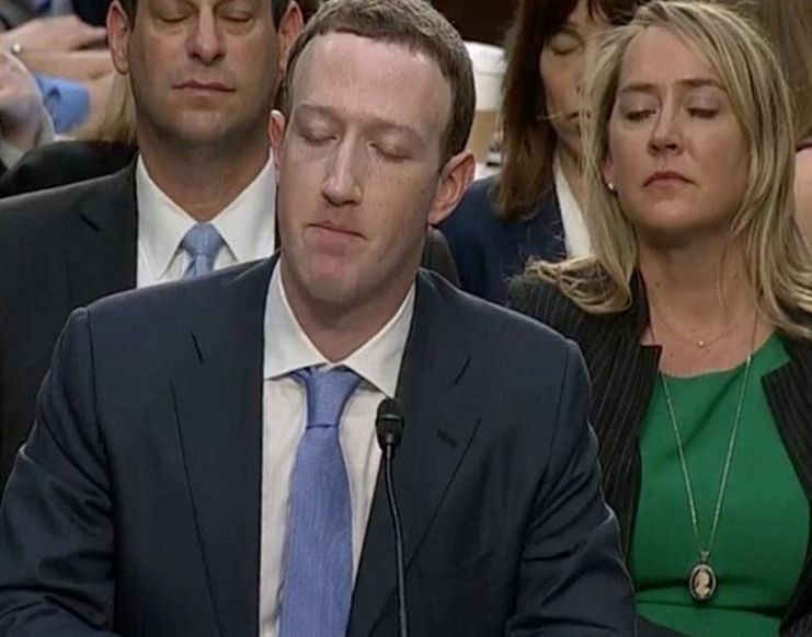 Facebook founder Mark Zuckerberg consulting his hive mind through telepathy