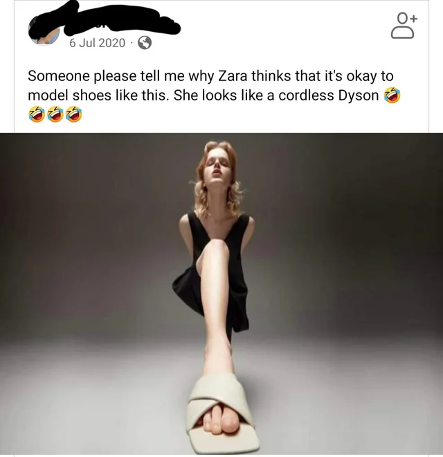 I'm not sure what's more confusing, the shoes or the pose